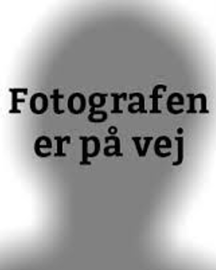 Figur der fortæller at foto er på vej